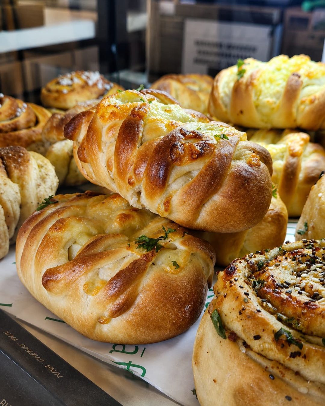 Cheese buns fresh from the oven on a baking tray